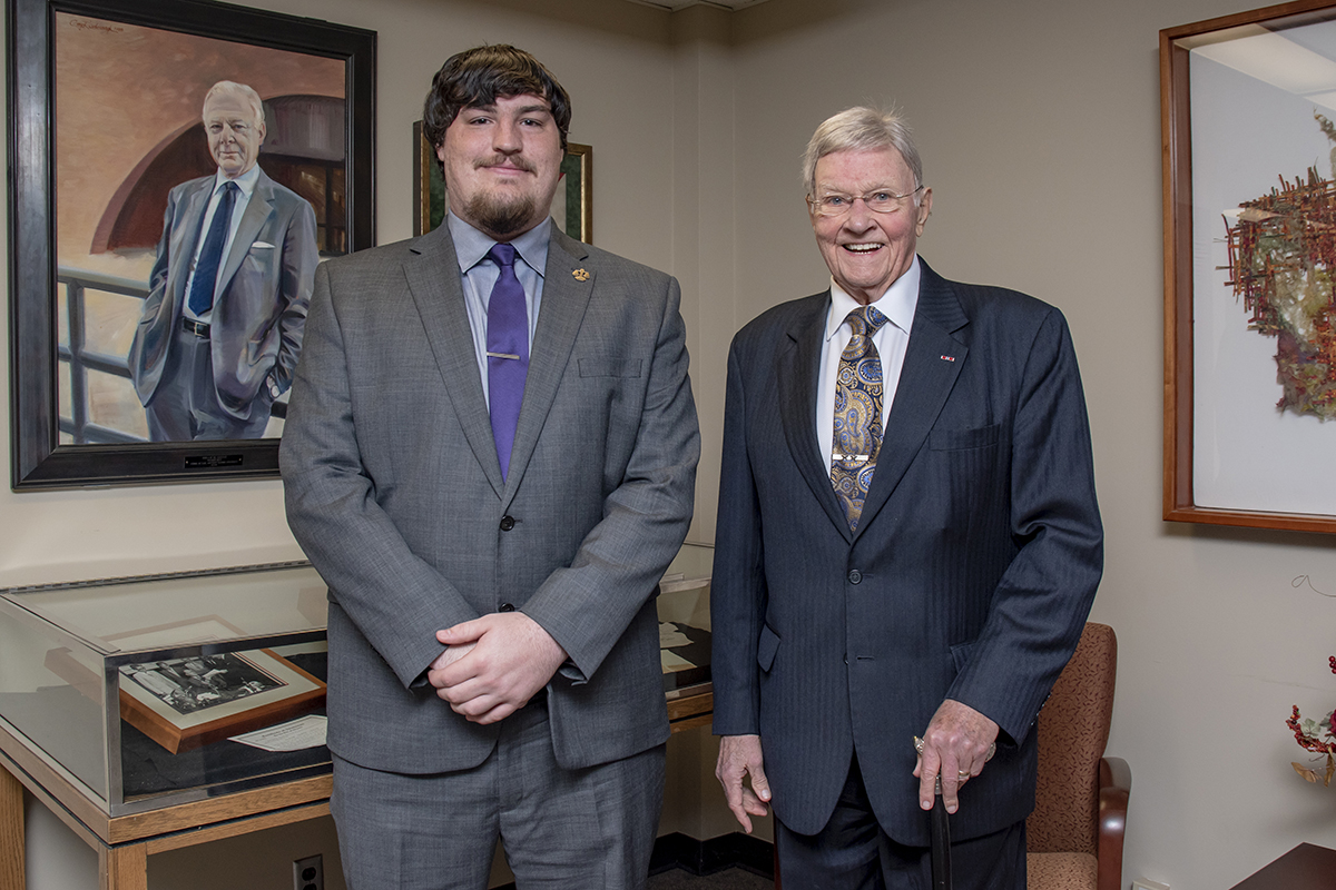 Pictured left to right: scholarship recipient Aaron Herkert and Judge Richard Mills