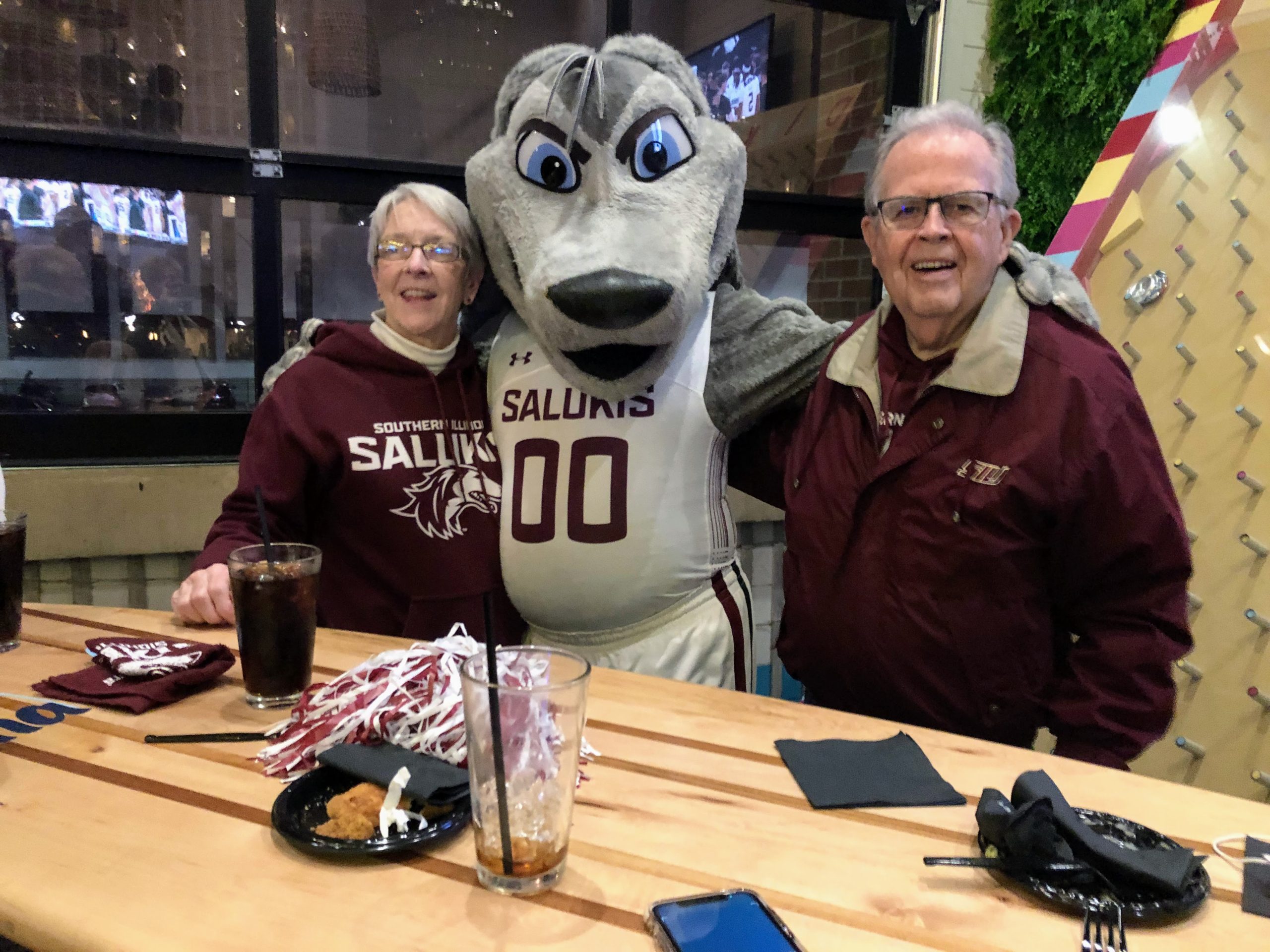 Pictured left to right: Melissa Jensen, Grey Dawg, and Robert Jensen 