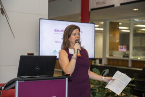 Diane Compardo speaks to the crowd at the inaugural Saluki Women's Weekend.