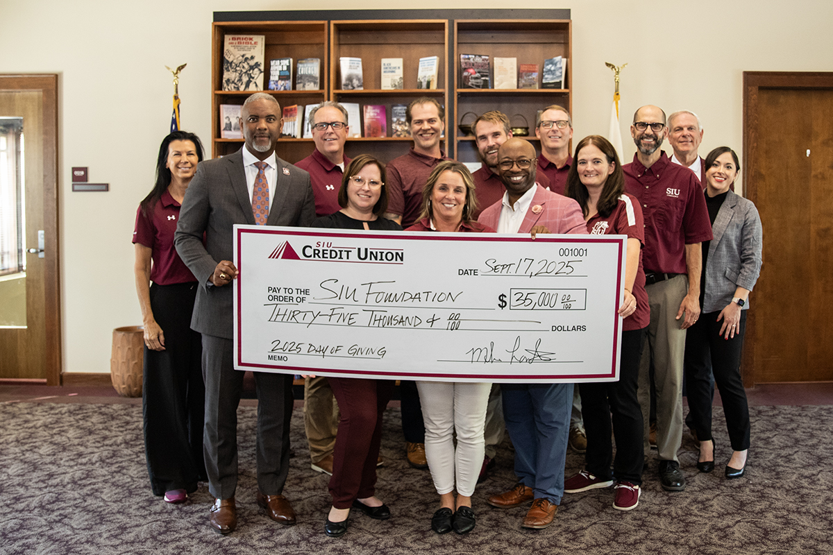 SIU Credit Union check presentation for SIU Day of Giving