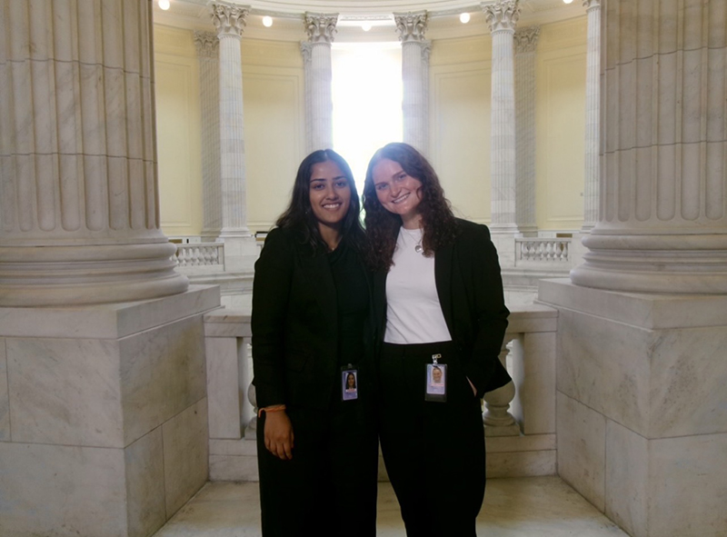 Photo of Anna Stearns and another intern on Capitol HIll.