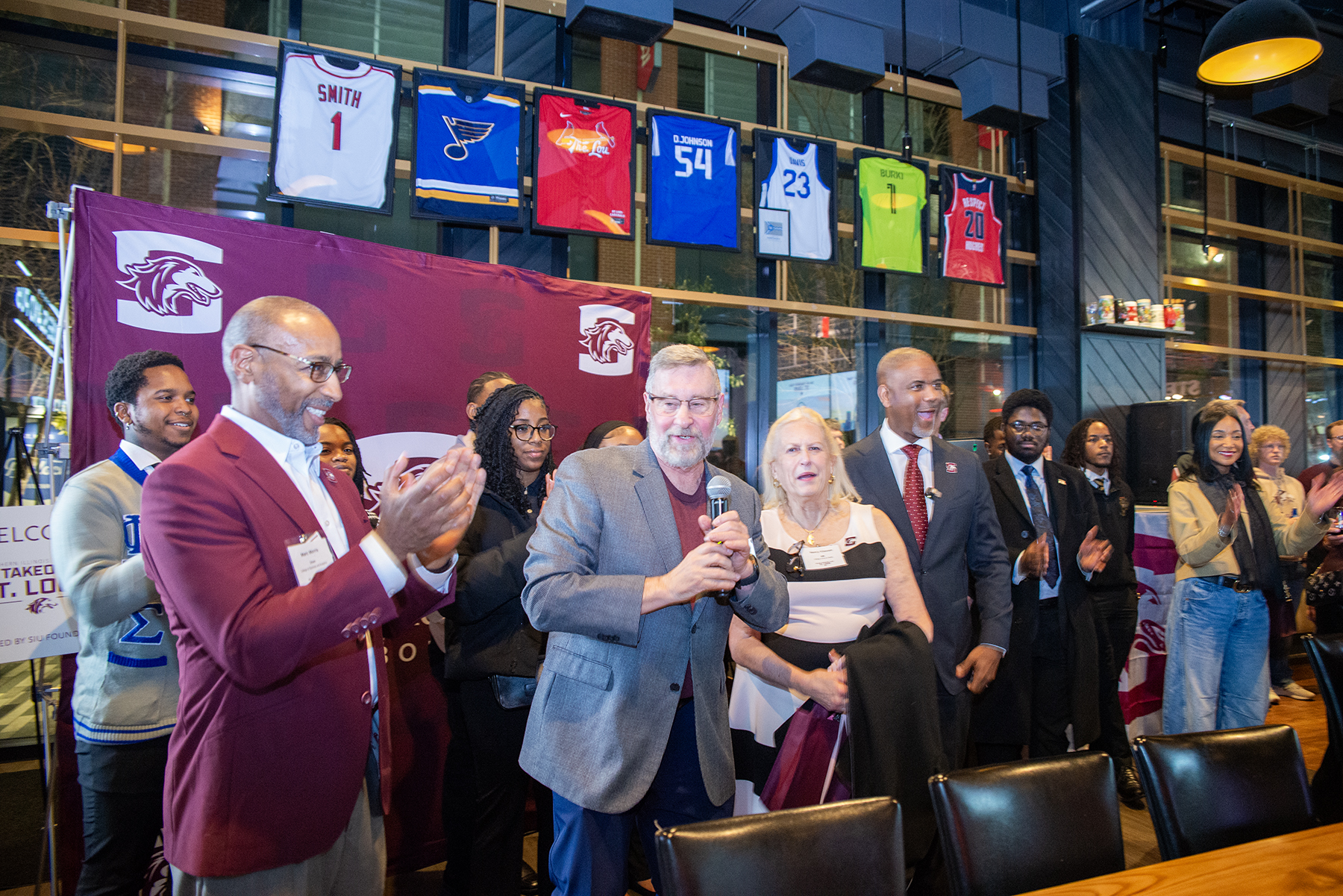 Alumni Richard and Nancy Klassen address the crowd at the Chancellor's Reception.