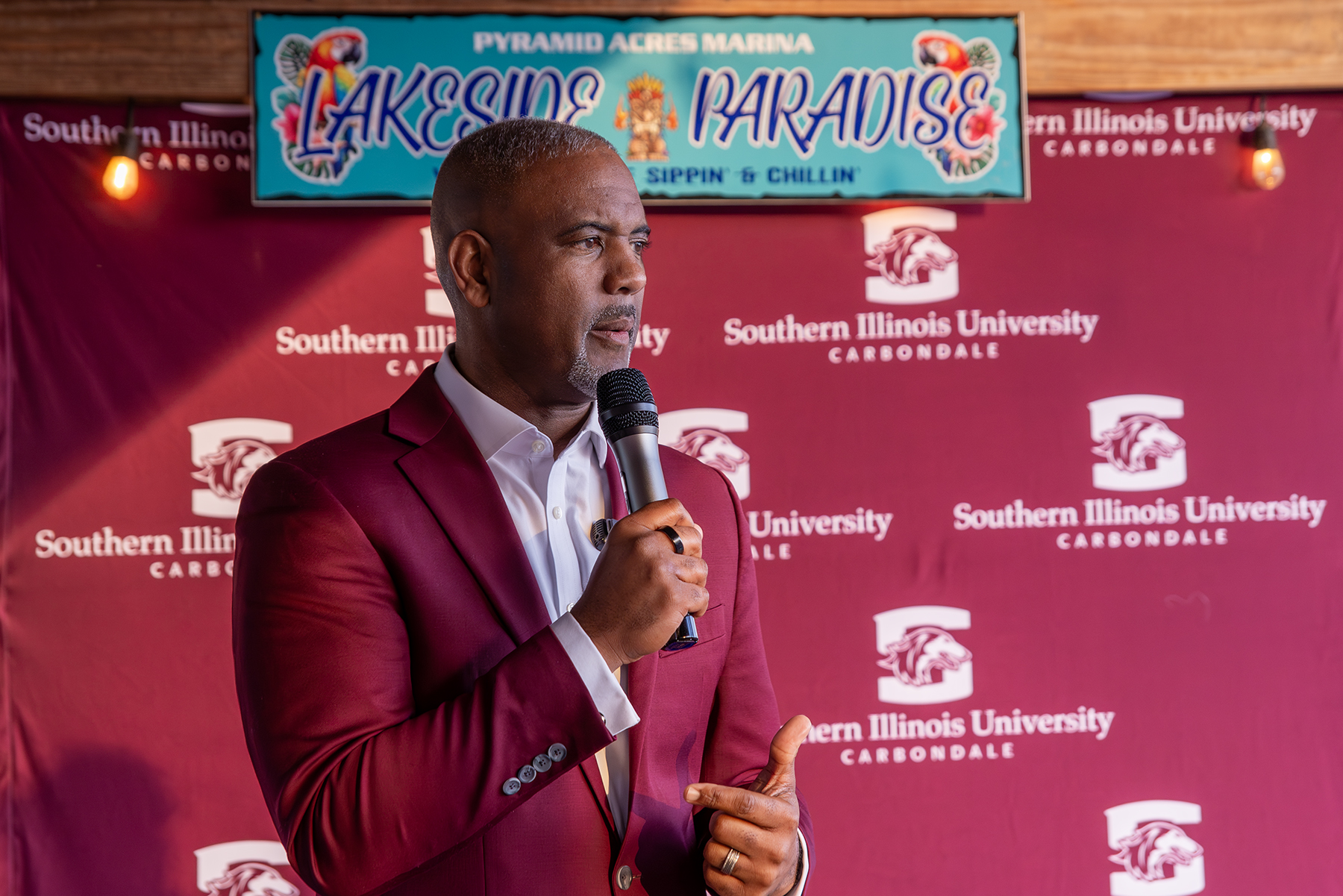 Chancellor Austin A. Lane addresses attendees during the Saluki Takeover Tour Southern Illinois event at Pyramid Acres Marina in Marion on April 7.