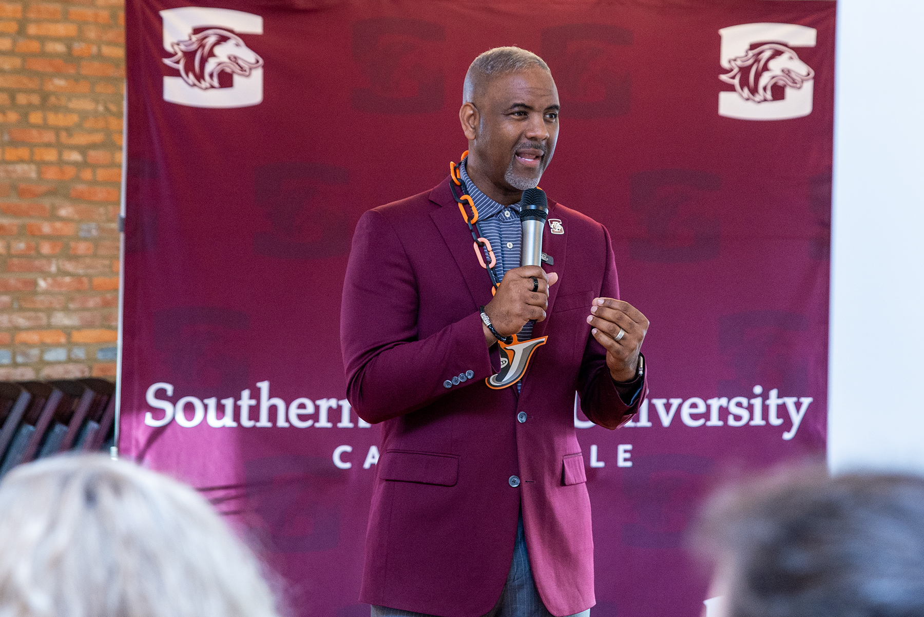 Chancellor Lane speaks to the crowd in Red Bud.