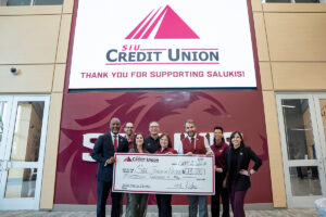 SIU Credit Union representatives present a check for SIU Touch of Nature Outdoor Education Center.