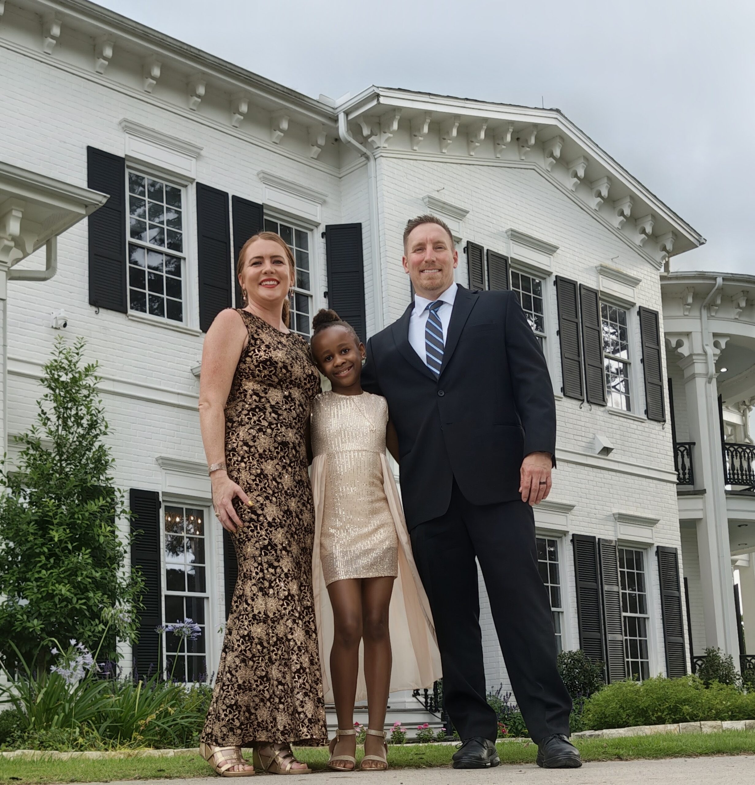 Family photo of Nick and Amanda Martin with their daugther, Miracle.