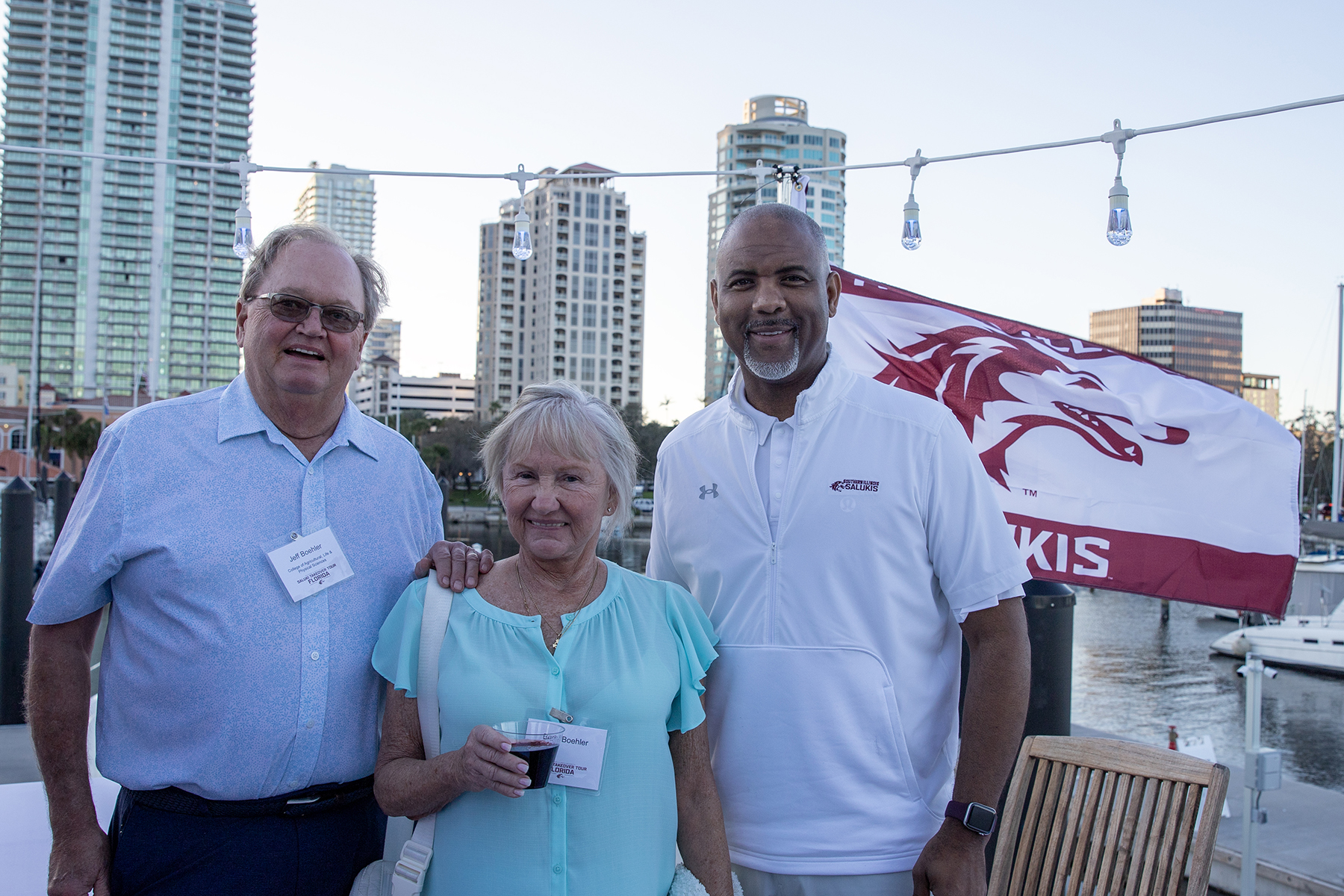 SIU alumnus Jeff Boehler and his wife, Barbara, join SIU Chancellor Austin A. Lane during the 2025 Saluki Takeover Tour in St. Petersburg, Florida. The Boehlers have committed $150,000 to support first-generation students at SIU through the Boehler Family First Saluki Center.